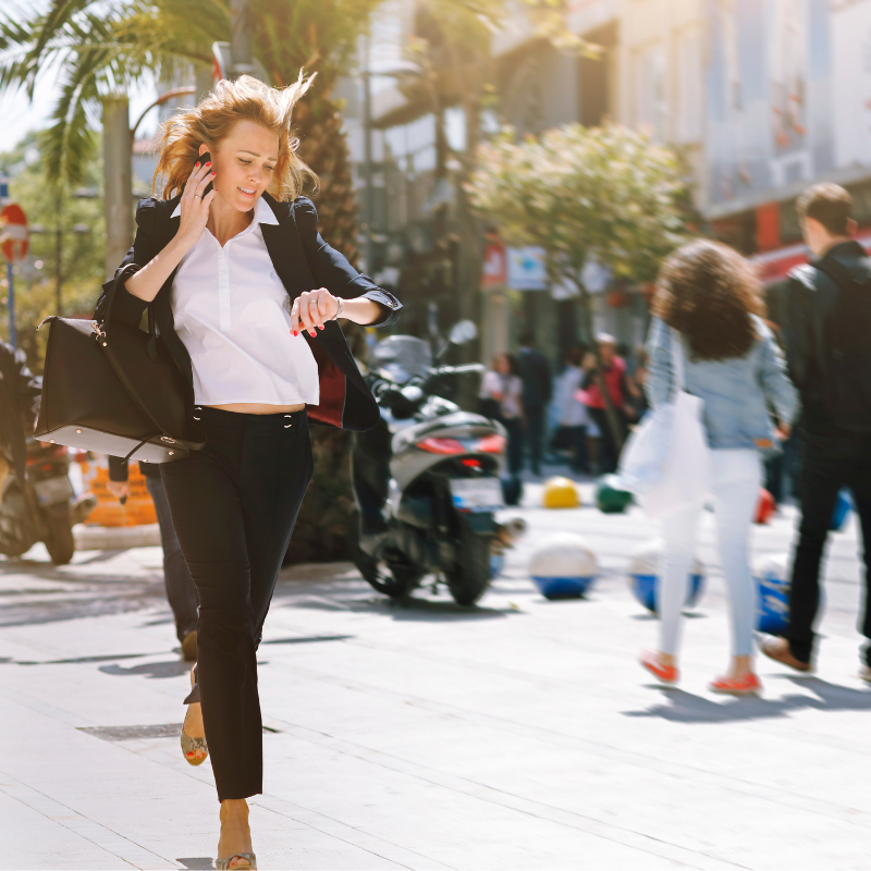 Lady rushing having just booked a babysitter